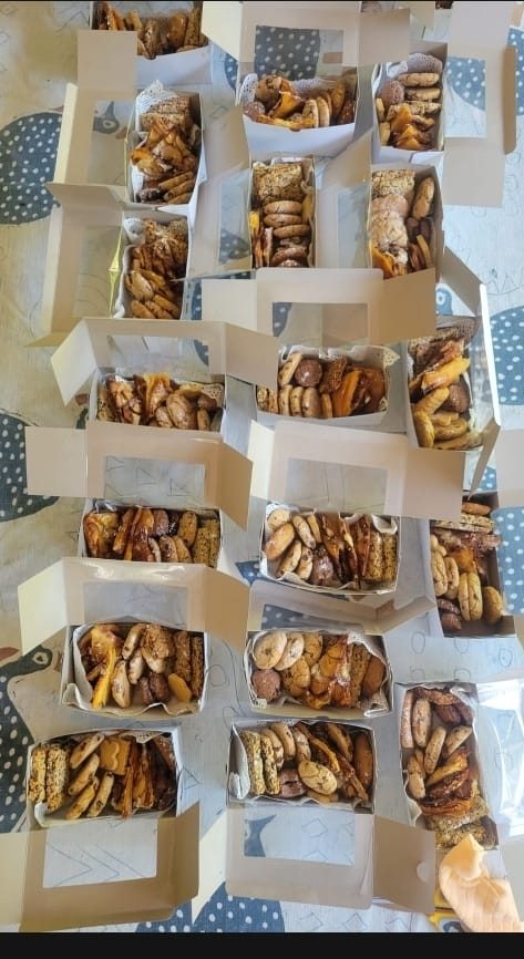Gift boxes packed with assorted home-baked biscuits